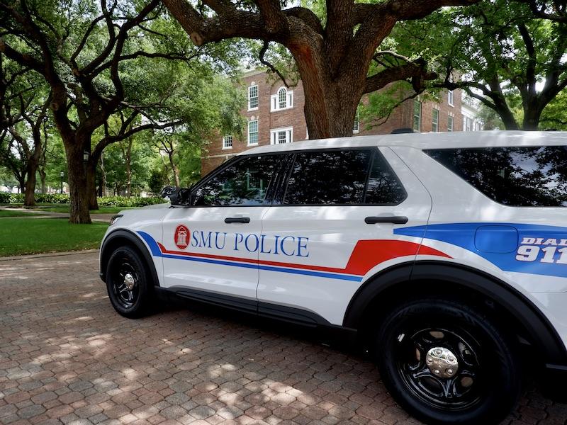 <img alt="image of parked SMU Police vehicle" src=_...html>