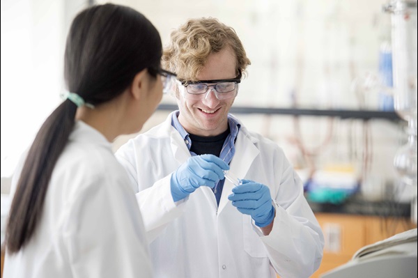 Chemistry faculty in lab