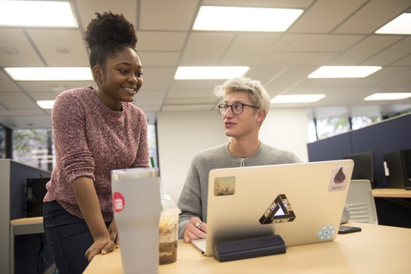 student studying in library