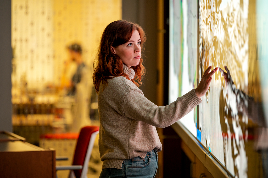 student working on touch screen