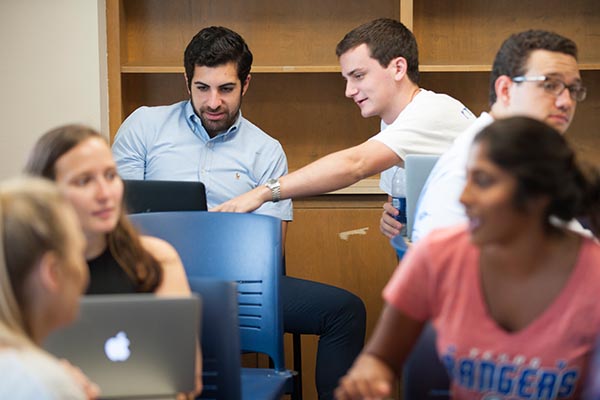 Students in a full classroom.