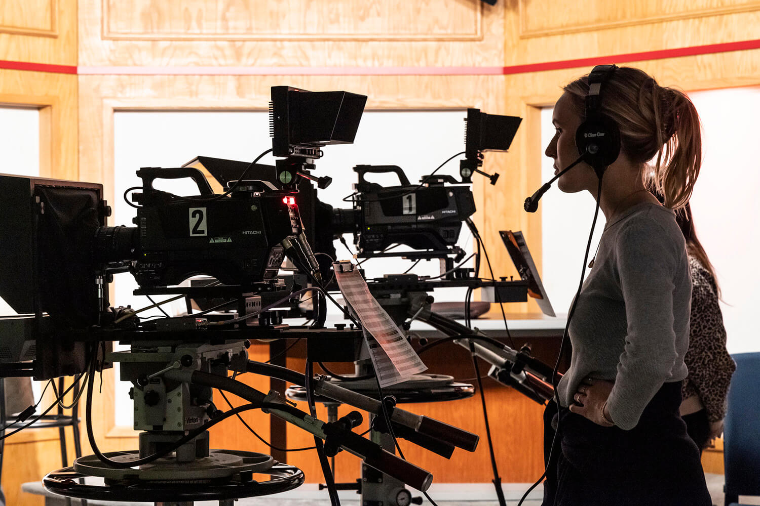 Girl-camera-broadcast-studio